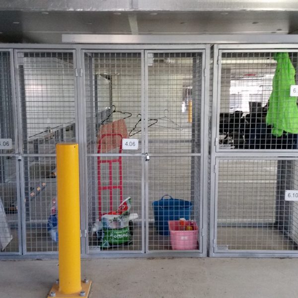 Example of Car Park Storage Solutions - Cages filled with items.
